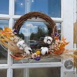 A fall wreath made in our fall wreath class